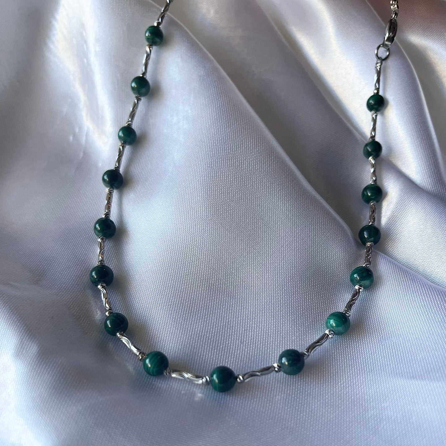 Conjunto de malaquita en titanio