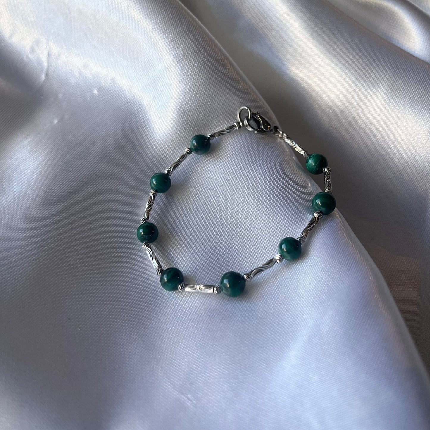 Conjunto de malaquita en titanio