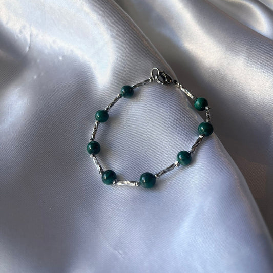 Conjunto de malaquita en titanio
