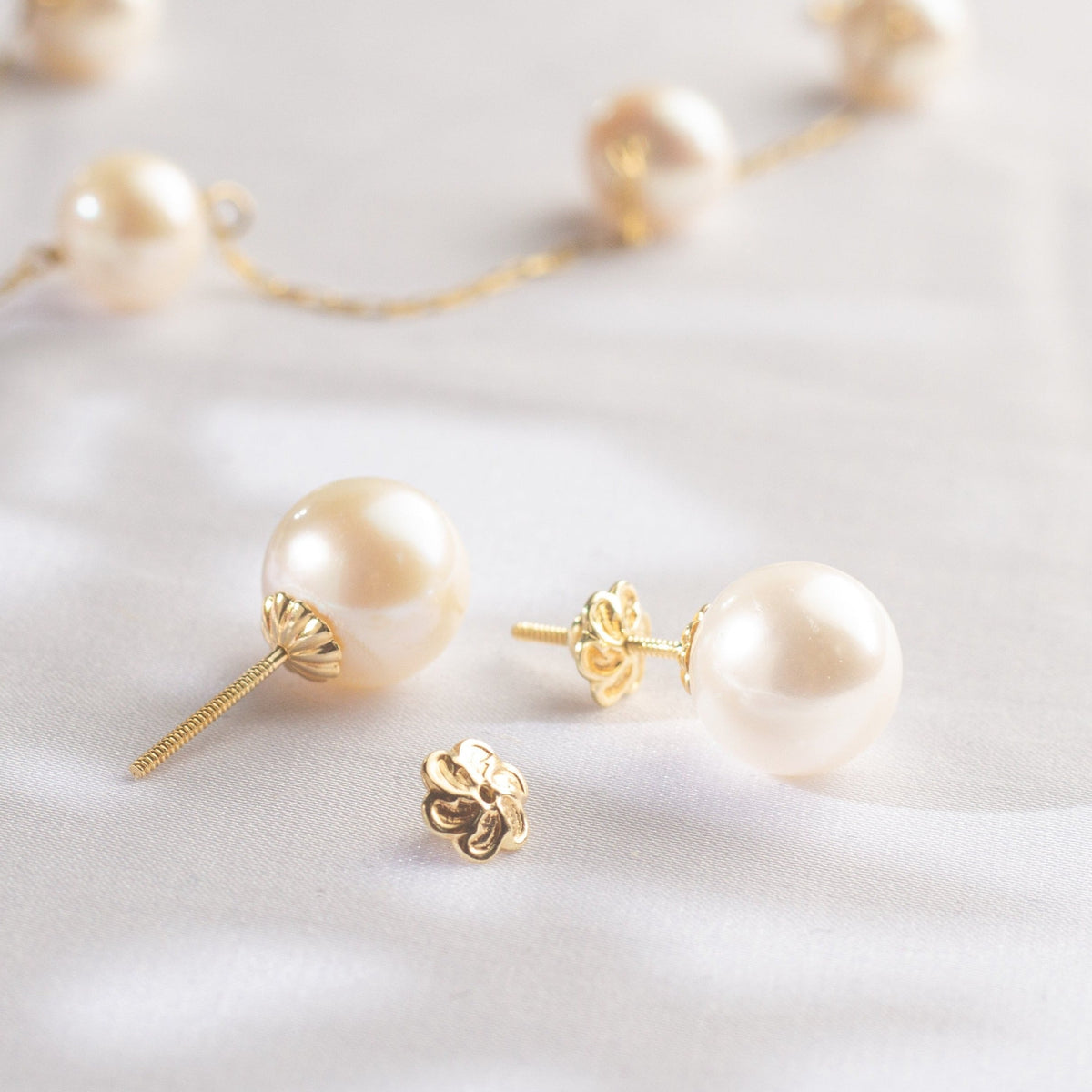 Caravanas de perlas y  oro 18k
